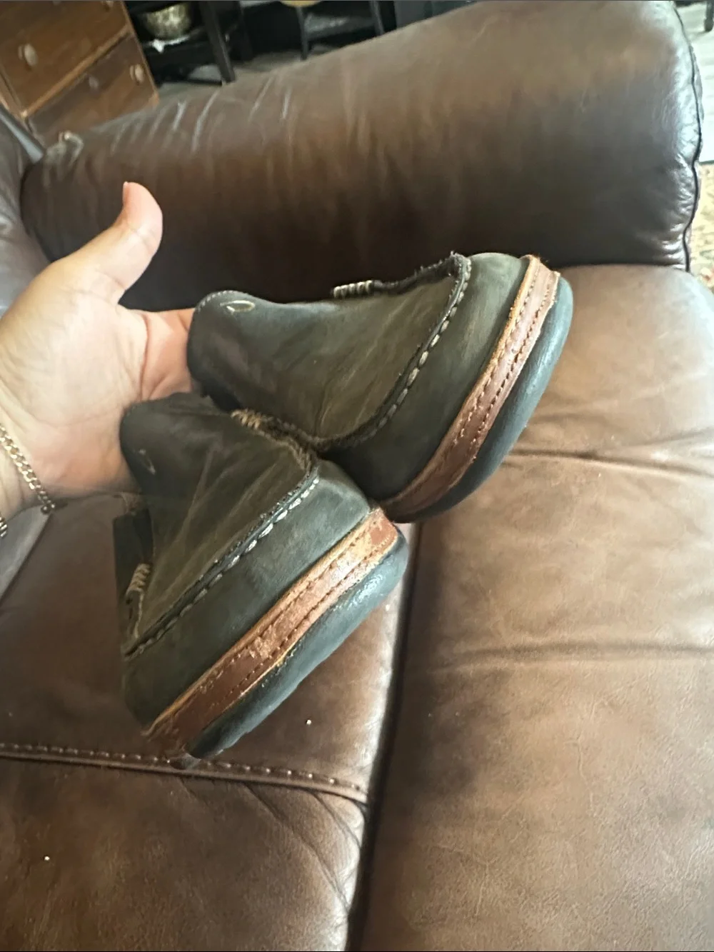 OluKai Men's Black Slip-On Loafers with Brown Trim